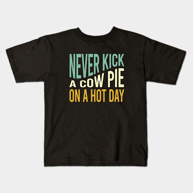 Cowboy Saying Never Kick a Cow Pie on a Hot Day Kids T-Shirt by whyitsme